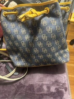 Dooney & Bourke Blue Monogram Bucket Bag with Yellow Trim